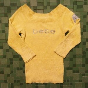 fuzzy pastel yellow bebe logo top
